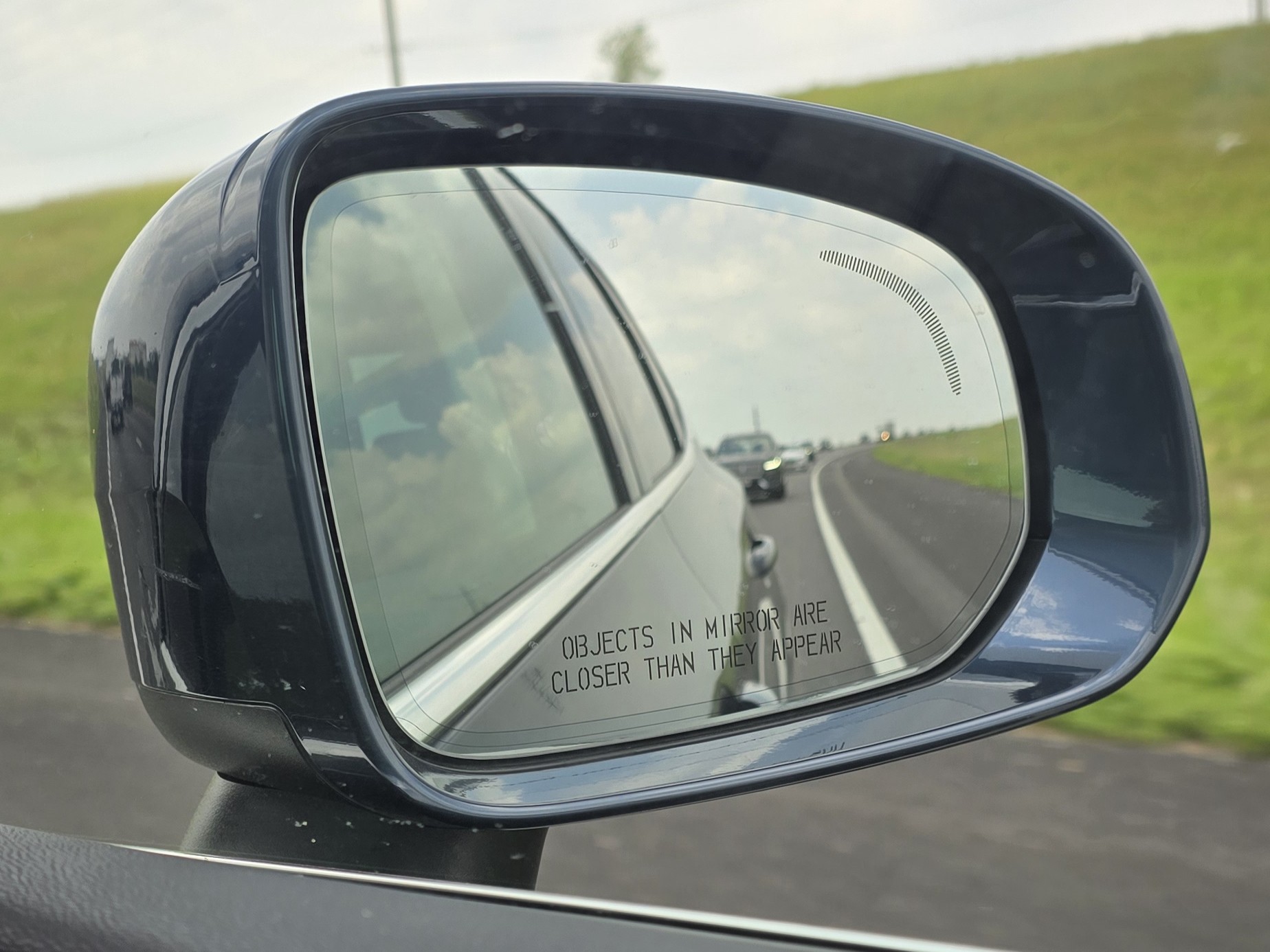 Rearview mirror photo taken while driving home when the idea for Texas Glass Girls first came up